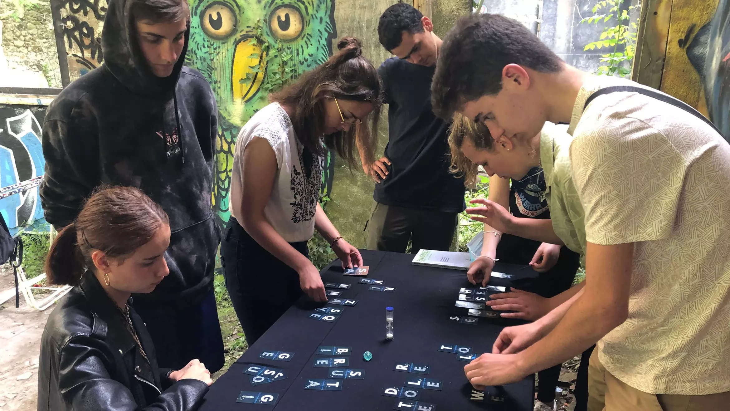 Group of young people playing the Dictopia prototype